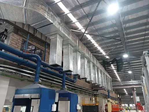 مخارج هواء ودكتات مغلفنة داخل صالة إنتاج | Galvanized ducts and air outlets inside a production hall